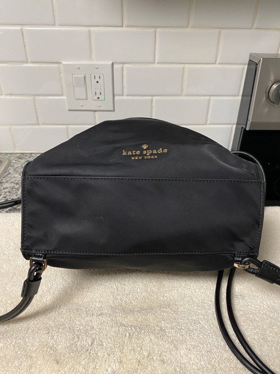 kate spade Black Nylon Drawstring Backpack with Gold Logo